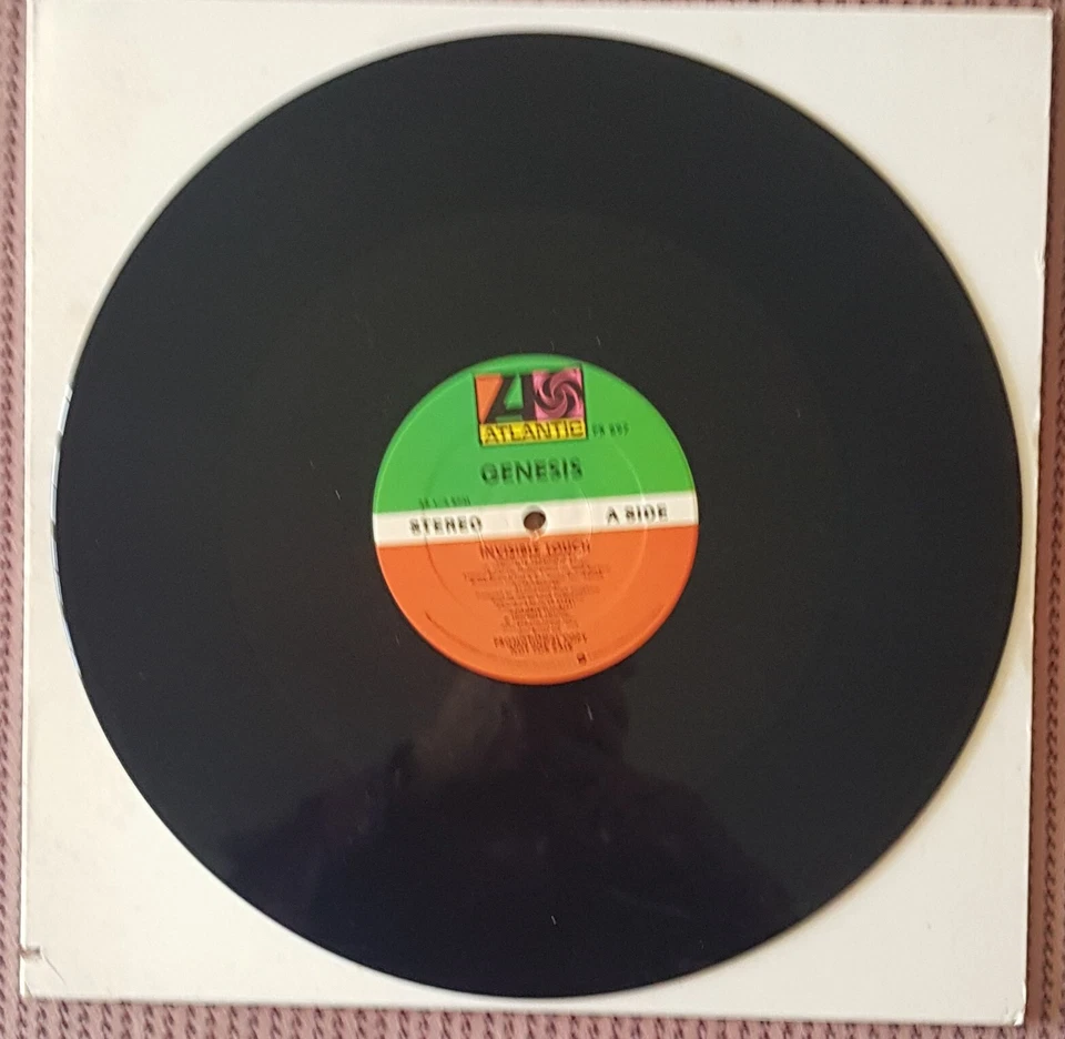 GENESIS INVISIBLE TOUCH RARE 12 INCH USA PROMO VINYL SINGLE, STICKERED SLEEVE - Image 1 of 1