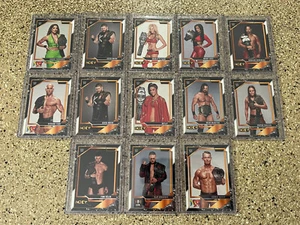 WWE NXT 2.0 GOLD BORDER 13 CARD BUNDLE SLEEVED NEAR MINT - Picture 1 of 7