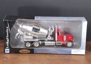 New-Ray Long Hauler 12003 PETERBILT 379 MAN Cement Mixer Truck 1:32 NEW Open Box - Picture 1 of 7