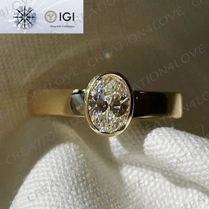 Anillo con bisel solitario de diamantes cultivado en laboratorio ovalado de 2 quilates en oro amarillo de 14 k - Imagen 1 de 12