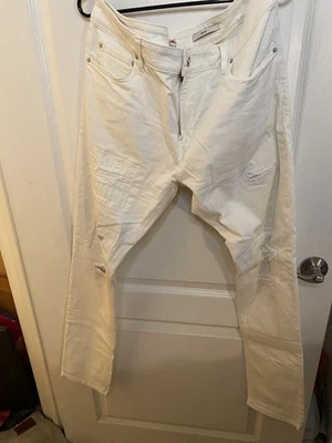 Jeans Guess blancos talla 36 tienen marcas Foto 1 de 4
