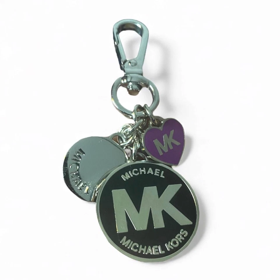 MICHAEL KORS - Dije Llavero Tono Plata Logo MK Bolso Circular Dije PÚRPURA Foto 1 de 3