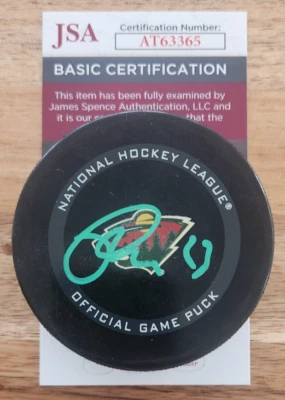 Marco Rossi Signed Official NHL Game Puck w/ JSA COA #AT63365 Minnesota Wild - Image 1 of 2