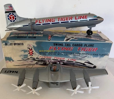 Avión de carga de cola oscilante TN JAPÓN a batería de colección Flying Tiger sin usar, en caja Foto 1 de 4