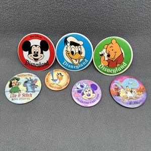 Lote De Colección De 7 Botones Pinback Disney Mickey Donald Pooh Minnie Stitch Aladdin - Imagen 1 de 19