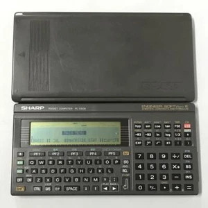 Sharp PC-E500 pocket computer 32KB memory large display BASIC language C338 - Afbeelding 1 van 9