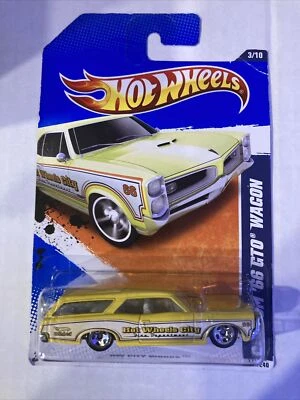 Hot Wheels #111 HW City Works Custom '66 GTO 2010 vagón amarillo 3/10 - R7536 DD5 Foto 1 de 4