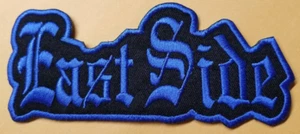 Parche azul bordado lado este aprox 2 x 4,75" - Imagen 1 de 2