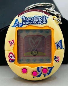 Bandai Tamagotchi Connection V2 Yellow Butterflies 2004 TESTED - Bild 1 von 4