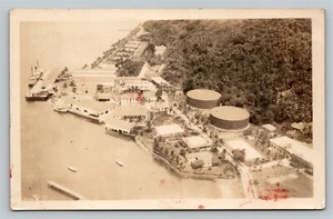 RPPC Real Photo a Shore Storage Facility Large and Small Ships Storage Tanks - Picture 1 of 2