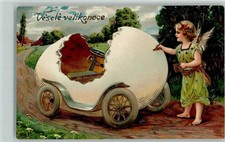 13210225 - fantasy automobile from an Easter egg, angel with a brush, good