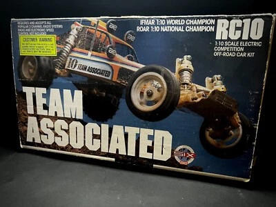 Vintage Team Associated Rc10 Buggy Gold with original box and instructions - Image 1 of 4