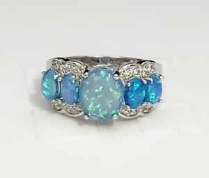 Fashion Jewelry Ring Synthetic Blue Opal Oval CZ's Silver Tone Size 8 - Picture 1 of 9