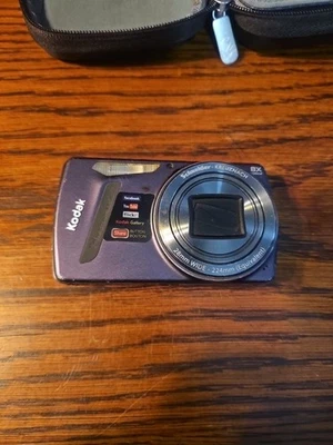  - CARGADOR ESTUCHE DE TRANSPORTE DE CÁMARA - Cámara digital Kodak EasyShare M580 púrpura Foto 1 de 4