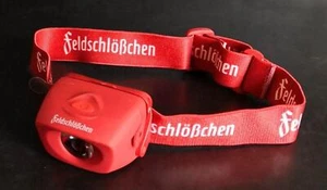 Feldschlößchen Stirnlampe, Freizeit, Outdoor, Campinglampe, Bier, LED, Neu! - Bild 1 von 2