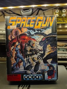 SPACE GUN GAME X COMMODORE 64 128 FLOPPY DISK C64 RARISSIMO BOX OCEAN - Zdjęcie 1 z 15