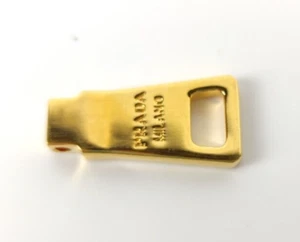 CURSORE PER CERNIERA LAMPO PRADA MILANO ORO ORIGINALE CURSORE DORATO METALLO - Picture 1 of 6