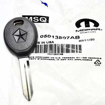 Llave en blanco genuina OEM MOPAR 1999-2000 Wrangler/Cherokee/Grand MASTER 5013807AB Foto 1 de 2