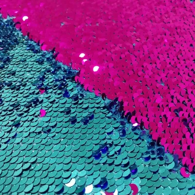 Tela reversible de lentejuelas y brillo - 2 yardas cambio de color (turquesa a fuc... Foto 1 de 4