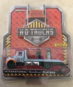 Greenlight HD Trucks International Durastar Flatbed Chase New - Picture 1 of 2