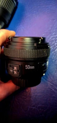 Yongnuo YN 50mm F1.8 N Autofocus Prime Lens for Nikon DSLR's  Front & Rear Caps - Image 1 of 2
