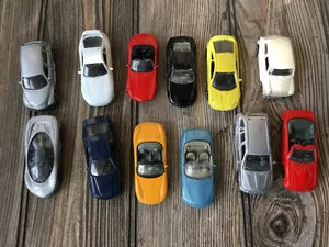Lote mixto de 12 coches diecast de marca/escala - Imagen 1 de 5