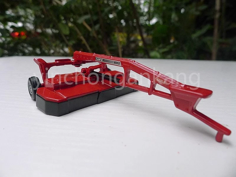 ERTL Case IH 1:64 Scale Diecast  Mower Brand New - Image 1 of 4