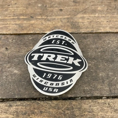 Trek Bicycle Head Tube Badge Emblem Waterloo 1976 Wisconsin USA Metal Black - Image 1 of 4