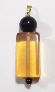 DE COLECCIÓN JUGO DE MANZANA BAQUELITA Y ÓNIX NEGRO CUENTAS 1.5" COLGANTE TONO DORADO ART DECO - Imagen 1 de 2