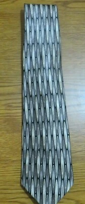 CORBATA ESTAMPADA GEOMÉTRICA SEDA MARRÓN NEGRO TOSTADO CARLOS DEVENEZIA Foto 1 de 4