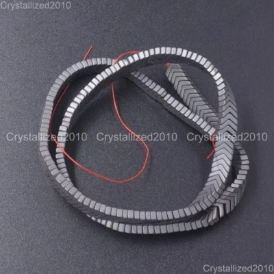 Cuentas espaciadoras con punta de flecha en forma de V de piedras preciosas de hematita natural metálicas mate 16" Foto 1 de 4