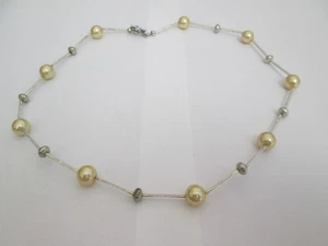 CORD NECKLACE WITH CREAM AND SILVER COLOURED BEADS / BARS - Picture 1 of 3