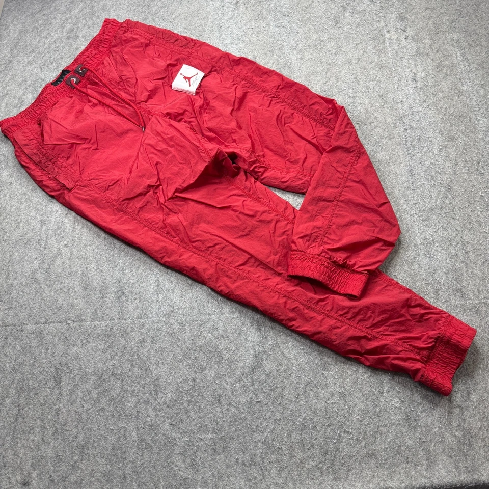 Pantalones Tejidos Nike Air Jordan Wings Of Flight 30" Retro 4 Hombres M Rojo BV1136-687 Foto 1 de 4