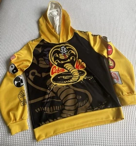 Cobra Kai Youth Hoodie Strike First, Strike Hard, No Mercy Karate Unisex, Size L - Picture 1 of 5