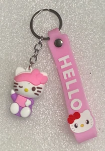 Winking Hello Kitty Keychain Purse Zipper Pull Pink/White/Purple NWOT US Seller - Picture 1 of 2