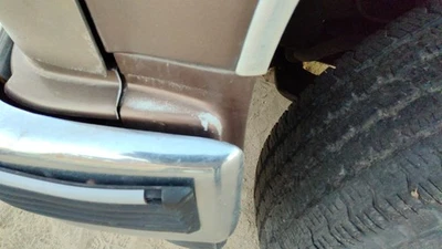 Chevy Suburban 1992-1999 conductor moldura izquierda de guardabarros OEM moldura marrón Foto 1 de 4