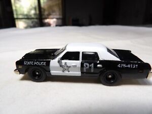 THE BLUES BROTHERS POLICE CAR       JOHNNY LIGHTNING HOLLYWOOD ON WHEELS    1:64