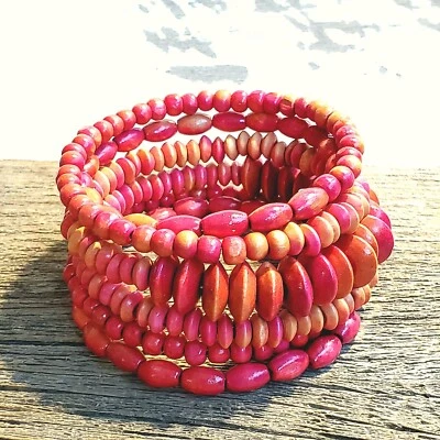 Pulsera envolvente de alambre de memoria cuentas de madera rosa descolorida sostenible vintage años 90 Bali Foto 1 de 4