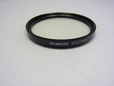 PROMASTER SPECTRUM 7 UV 62mm Lens Filter Made in Japan (w/ smudges scratches ) - Image 1 of 4