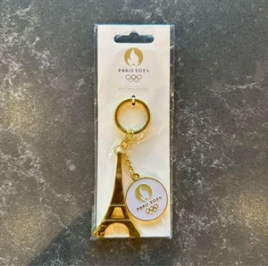 Llavero dorado Torre Eiffel de los Juegos Olímpicos de París 2024 con logotipo coleccionable sin usar - Imagen 1 de 3