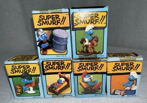 Vintage Super Schlümpfe Konvolut PVC Figur 6er Set in Box Pferd Feuerwehrmann Bett Schaukel - Bild 1 von 12