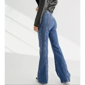 Pantalones de mezclilla acampanados Free People Florence tiro alto índigo azul oscuro talla 31 nuevos con etiquetas - Imagen 1 de 9