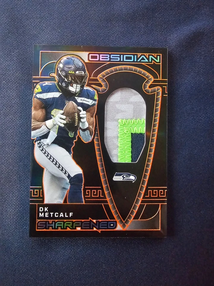 2023 Panini Obsidian - Sharpened Swatches DK Metcalf  Electric Etch Orange /49 - Image 1 of 2