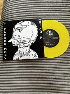 Sleaford Mods Hot Chip Nom Nom Nom Cat Burglar Yellow 7" (David Shrigley) - Picture 1 of 2