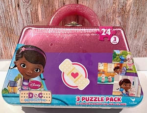 Cartera de metal de hojalata Doc McStuffins Disney Junior con juego de 3 rompecabezas nueva sellada - Imagen 1 de 9