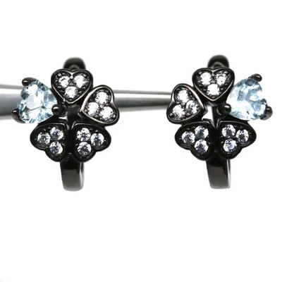 Plata de ley 925 4 x 4 mm. Pendientes de topacio azul cielo y circonitas blancas Foto 1 de 4