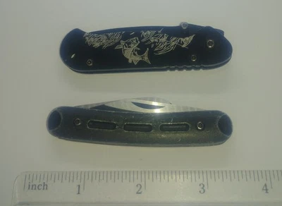 Par de cuchillos de bolsillo Winchester usados Foto 1 de 3