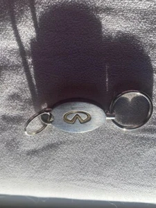 Auténtico Llavero/Anillo Infiniti Automobile Infiniti Logo Acero Estado Original. - Imagen 1 de 10