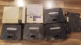 Broken/Untested Lot of 7 Super Nintendo SNES NES 64 N64 Consoles FOR PARTS AS IS