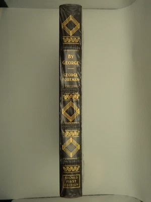LIBRO ENCUADERNADO EN CUERO EASTON PRESS FIRMADO POR GEORGE FOREMAN PRIMERA EDICIÓN "MI GEORGE" Foto 1 de 4